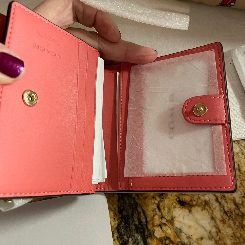 Peanuts x Coach Snap Wallet Lucy CBN89 IMBCV Bright Coral Multi